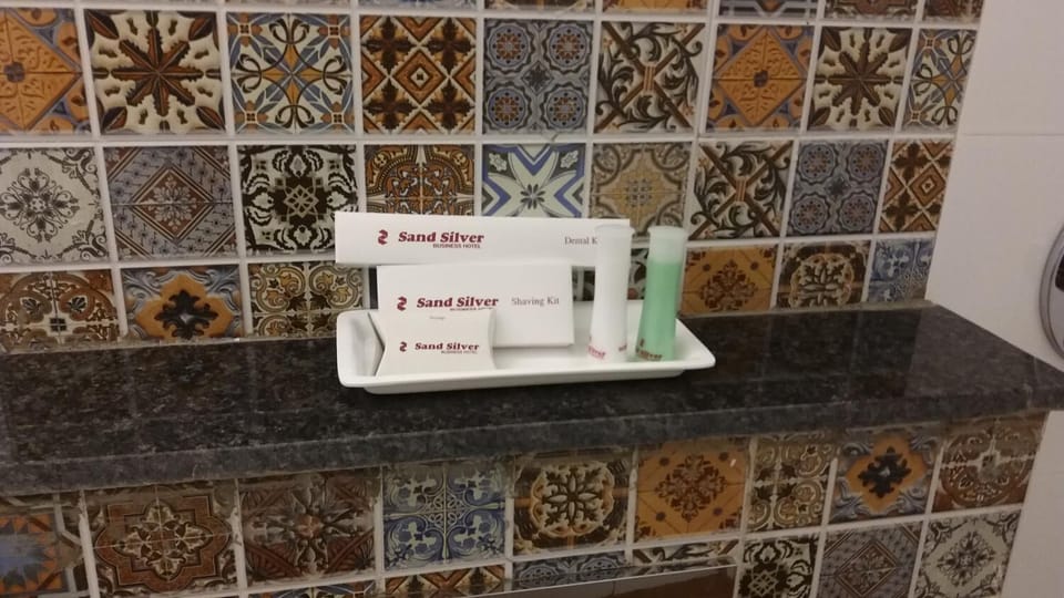 Shower, rainfall showerhead, towels