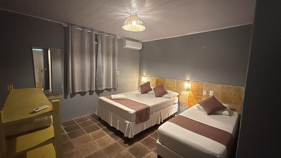 Grand Triple Room | Minibar, individually furnished, blackout drapes, free WiFi