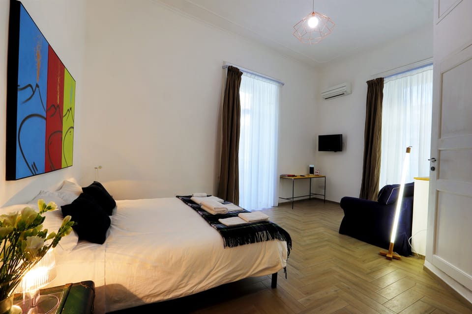 Junior Suite | In-room safe, desk, blackout drapes, iron/ironing board