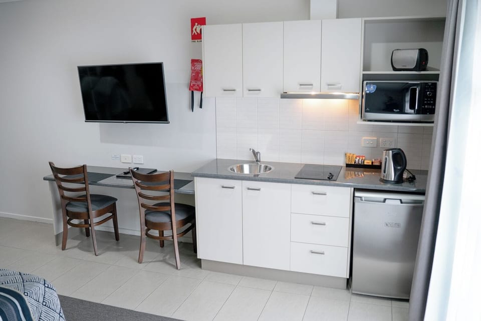 Fridge, microwave, coffee/tea maker, toaster