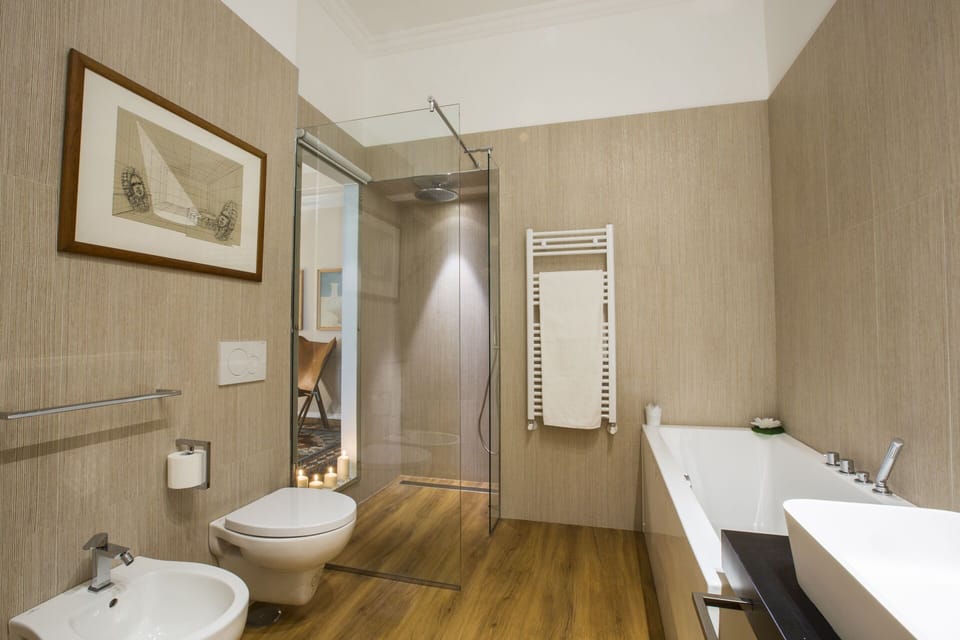The bathroom in the beige bedroom