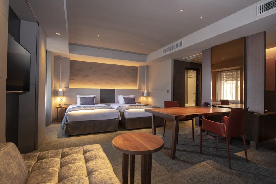 In-room safe, laptop workspace, blackout drapes, soundproofing