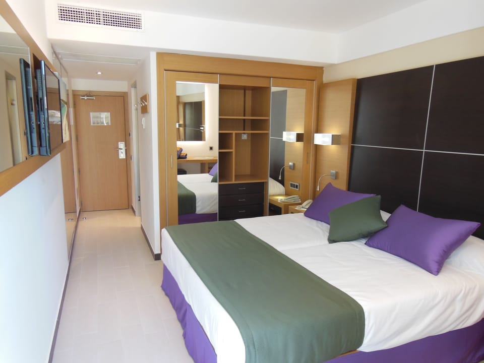 Minibar, desk, blackout drapes, soundproofing