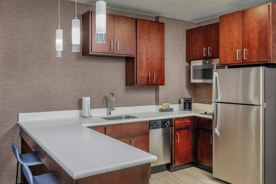 Suite, 2 Bedrooms | In-room safe, desk, laptop workspace, iron/ironing board