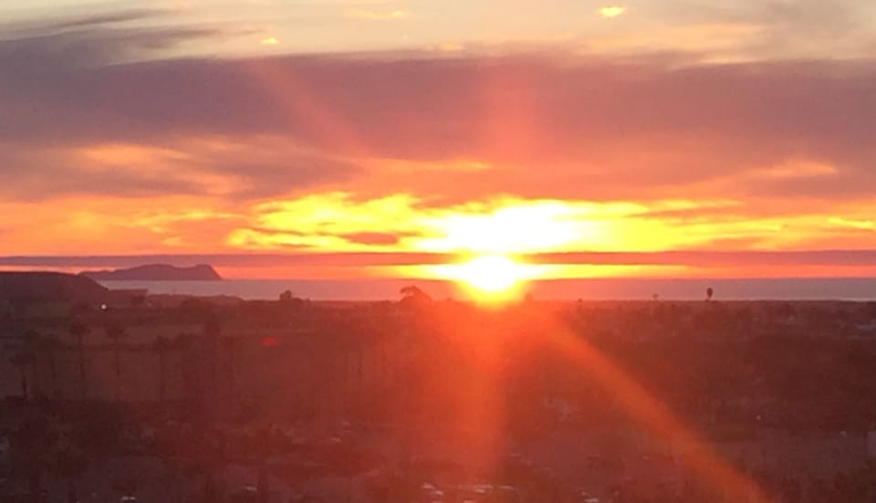 Beautiful sunset ocean view and an island off the coast of Mexico