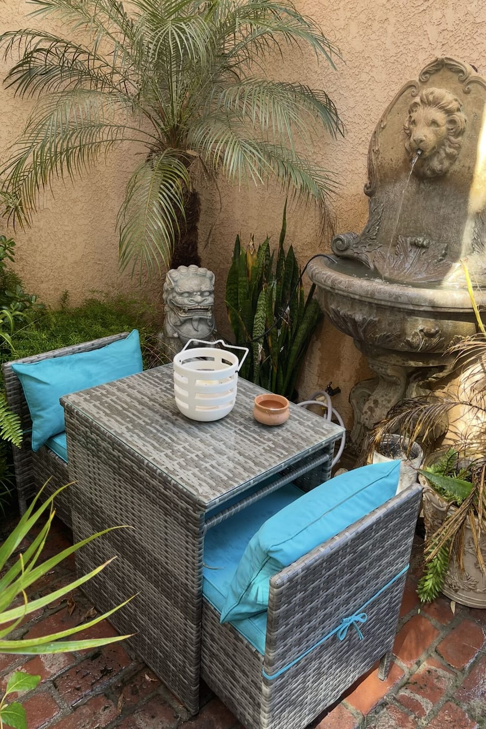 First level patio with soothing fountain accessible  through 2nd living area