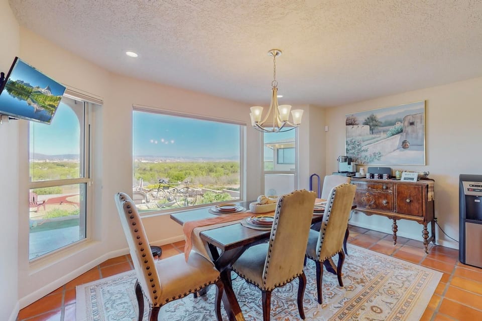 Dining Room/Kitchen looking out over the beautiful Rio Grande & Sandia Mountains