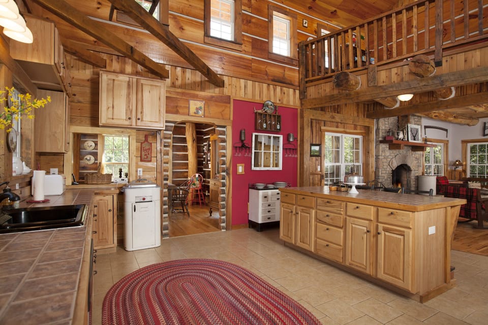 Very large kitchen with Island and pass thru window into the charming Dining Rm.