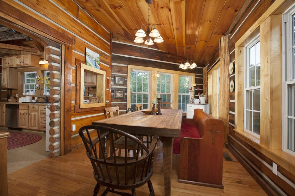 Cantilevered Dining Room with custom made 8ft Farmhouse table with ample seating