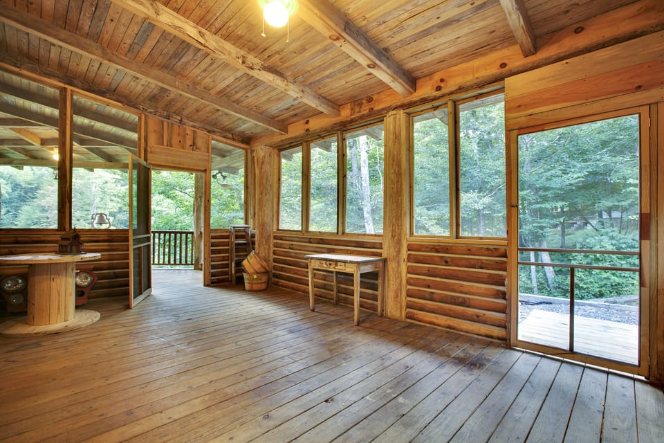 This is now a sleeping Porch w/ hanging queen bed since these photos were done