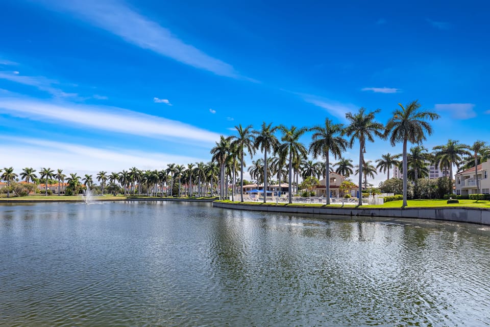 Take in the view of the grounds w/ beautiful pond surrounding the pool