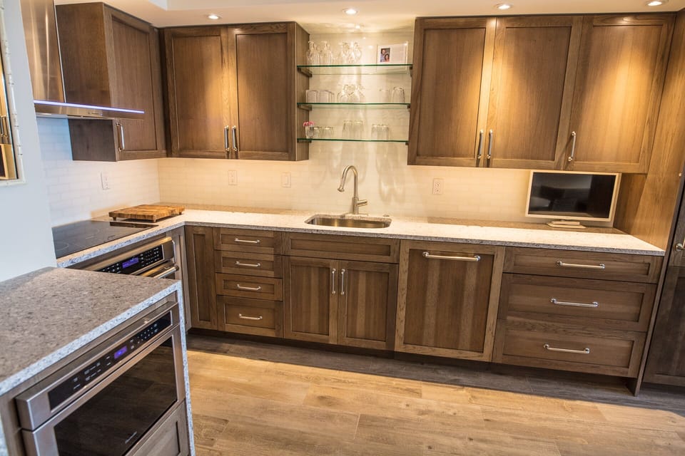 Hickory cabinets w/ storage for groceries | Beautiful low voltage lighting. 