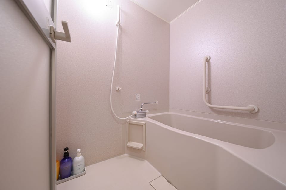 Japanese Style Room, Non Smoking | Bathroom | Separate tub and shower, spring water tub, free toiletries, hair dryer