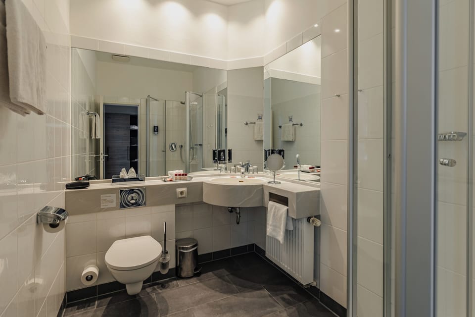 Shower, free toiletries, slippers, towels
