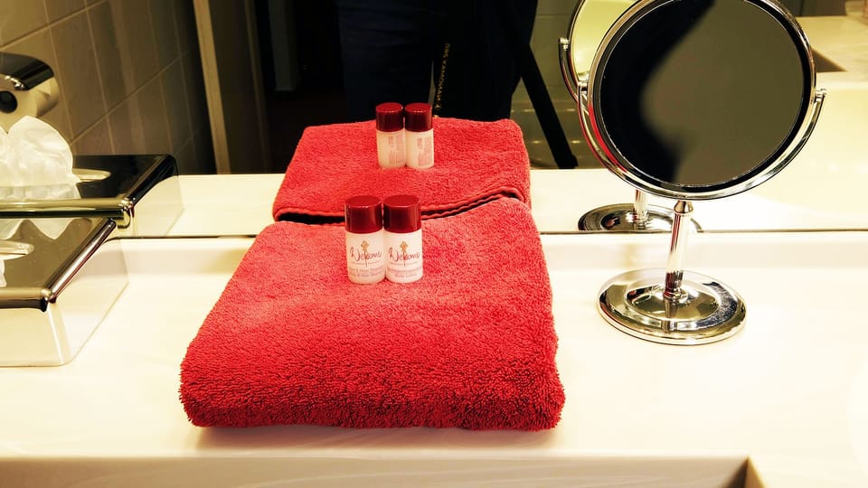Shower, free toiletries, slippers, towels