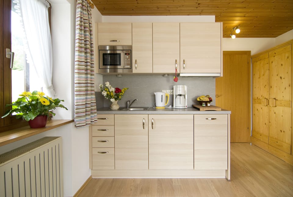 Apartment, 1 Bedroom, Balcony | Private kitchen | Full-size fridge, microwave, stovetop, dishwasher