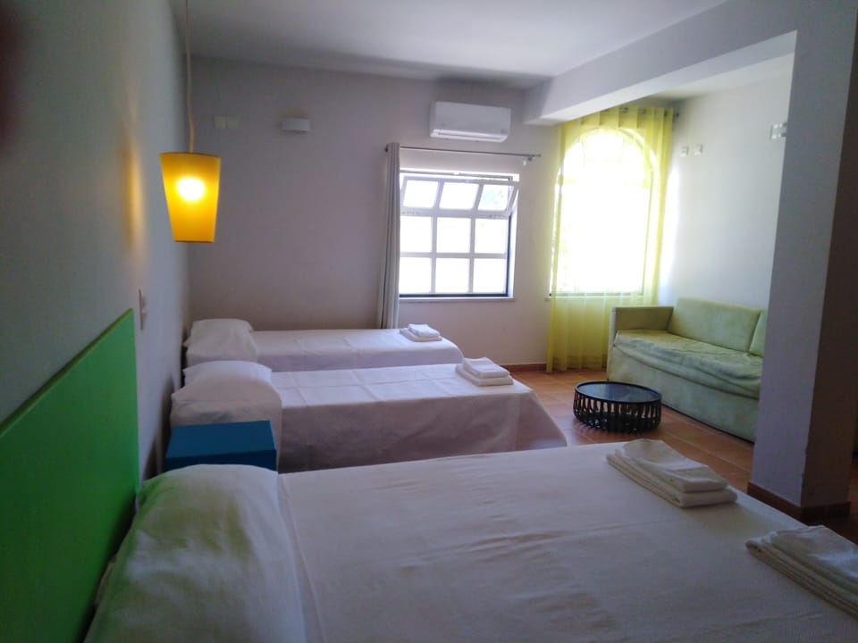 Family Quadruple Room | Blackout drapes, free WiFi, bed sheets