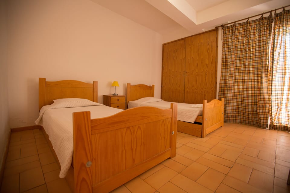 Basic Twin Room, 2 Twin Beds, Private Bathroom | 20 bedrooms, soundproofing, iron/ironing board, free WiFi