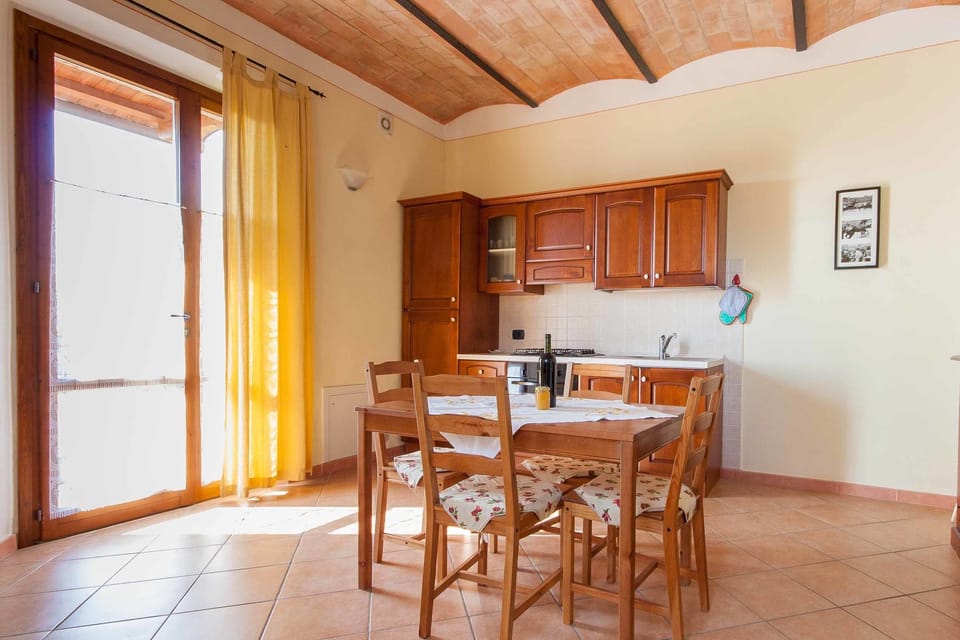 Apartment, 1 Bedroom (Le Volticine) | Private kitchen | Full-size fridge, oven, stovetop, dishwasher