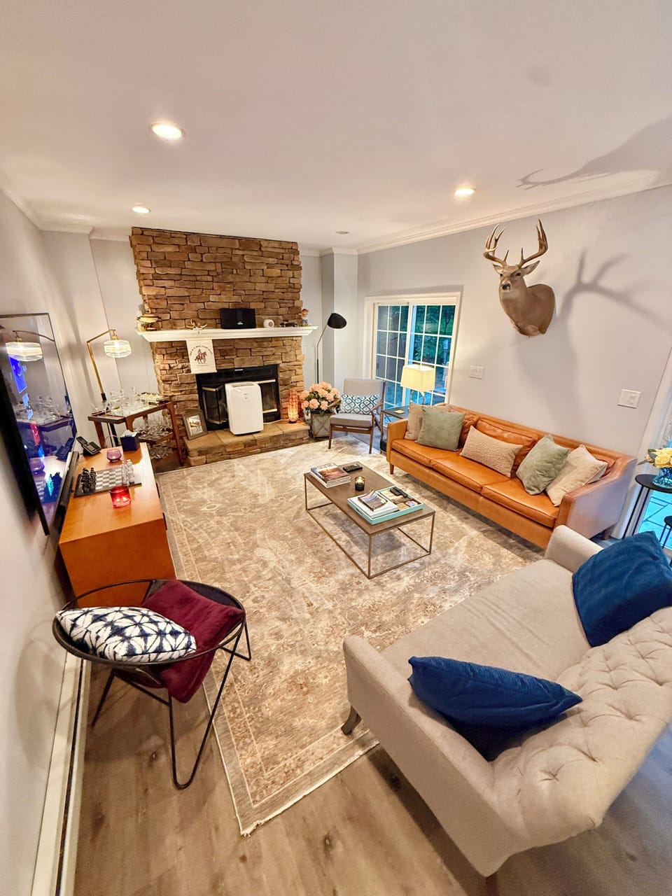 Ground floor living room with 75inch TV
