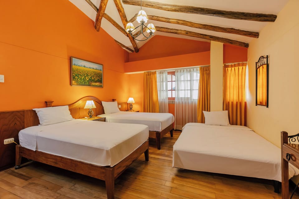Triple Room | Down comforters, individually decorated, laptop workspace