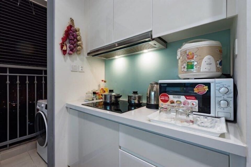 Apartment, 2 Bedrooms | Private kitchen | Full-size fridge, microwave, stovetop, electric kettle