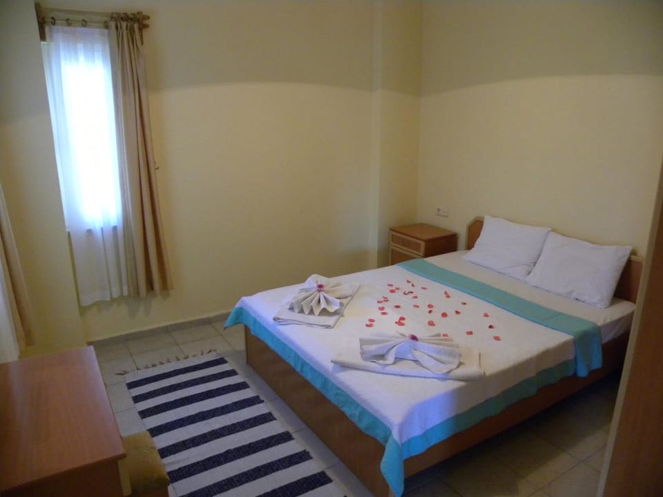 Family Apartment, 2 Bedrooms | 2 bedrooms, iron/ironing board, cribs/infant beds, rollaway beds