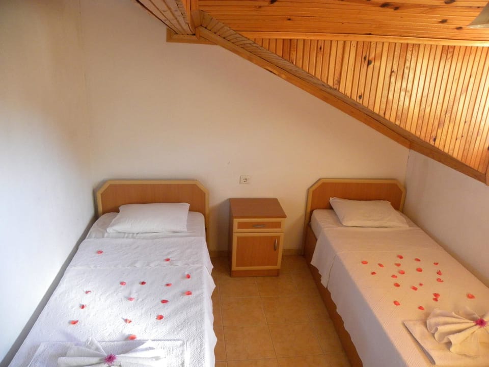 Family Apartment, 2 Bedrooms | 2 bedrooms, iron/ironing board, cribs/infant beds, rollaway beds