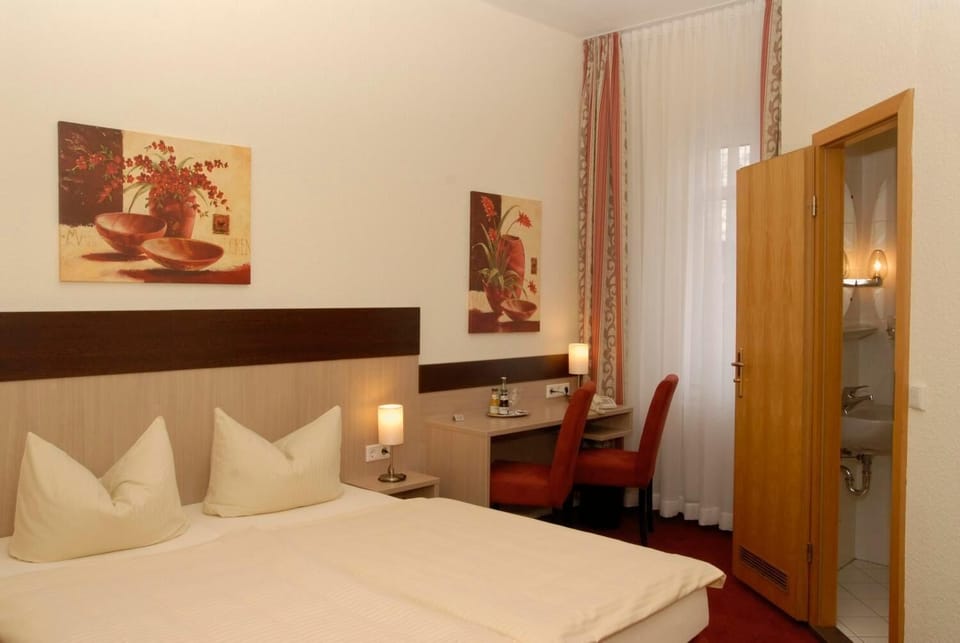 Desk, blackout drapes, free WiFi, bed sheets