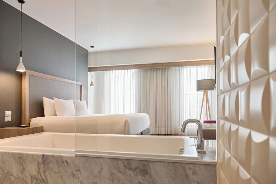 The Townhouse | Bathroom | Designer toiletries, hair dryer, towels, soap