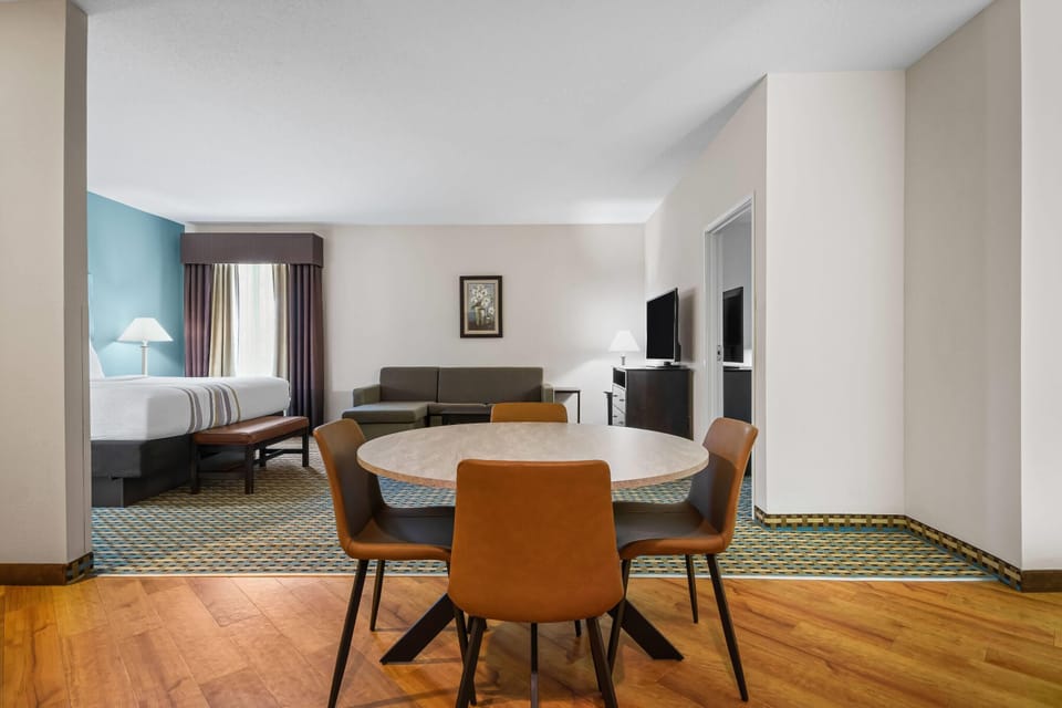 Suite, Multiple Beds (Various Views) | Pillowtop beds, desk, laptop workspace, iron/ironing board