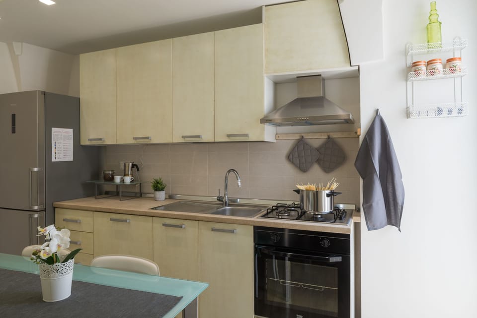 Apartment, 1 Bedroom | Private kitchen | Full-size fridge, oven, stovetop, dishwasher