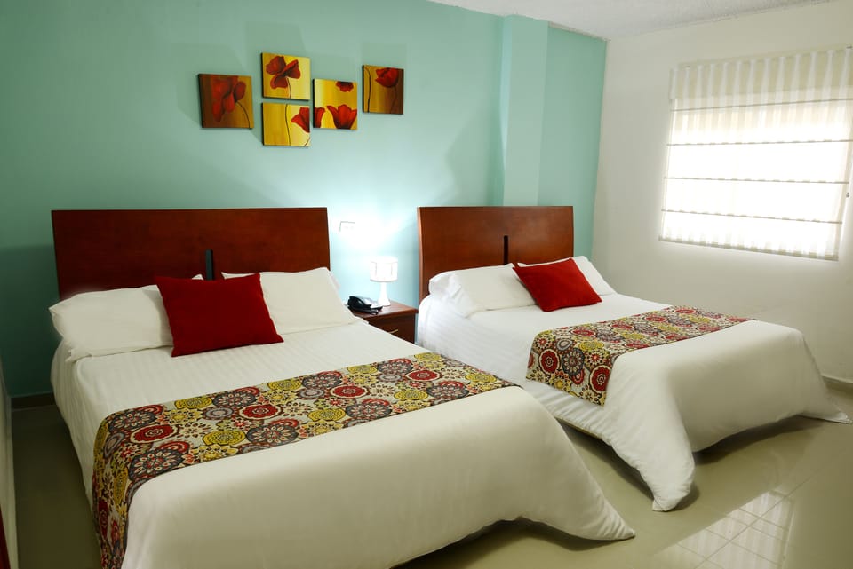 Family Triple Room, 2 Double Beds, Non Smoking | In-room safe, free WiFi