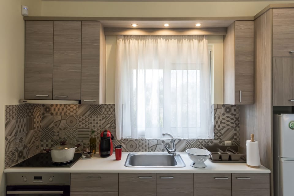 Villa | Private kitchen | Fridge, coffee/tea maker