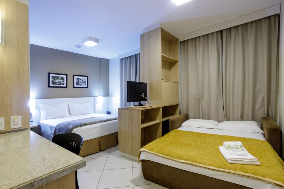 Superior Room, Accessible | Minibar, in-room safe, desk, blackout drapes