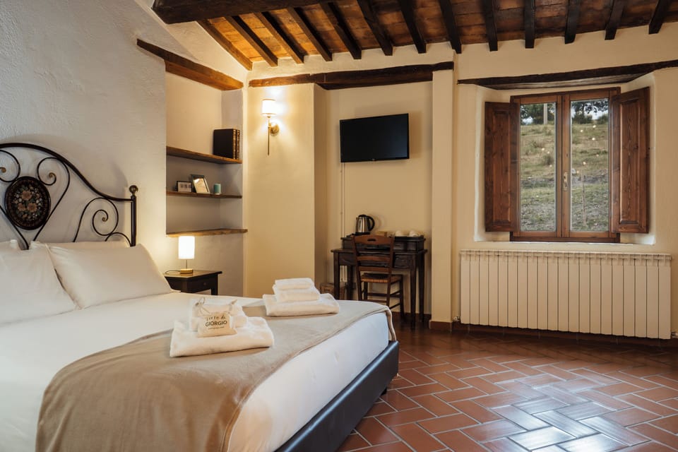 Deluxe Double Room, 1 Queen Bed, Private Bathroom, Mountain View | Frette Italian sheets, premium bedding, down comforters, pillowtop beds