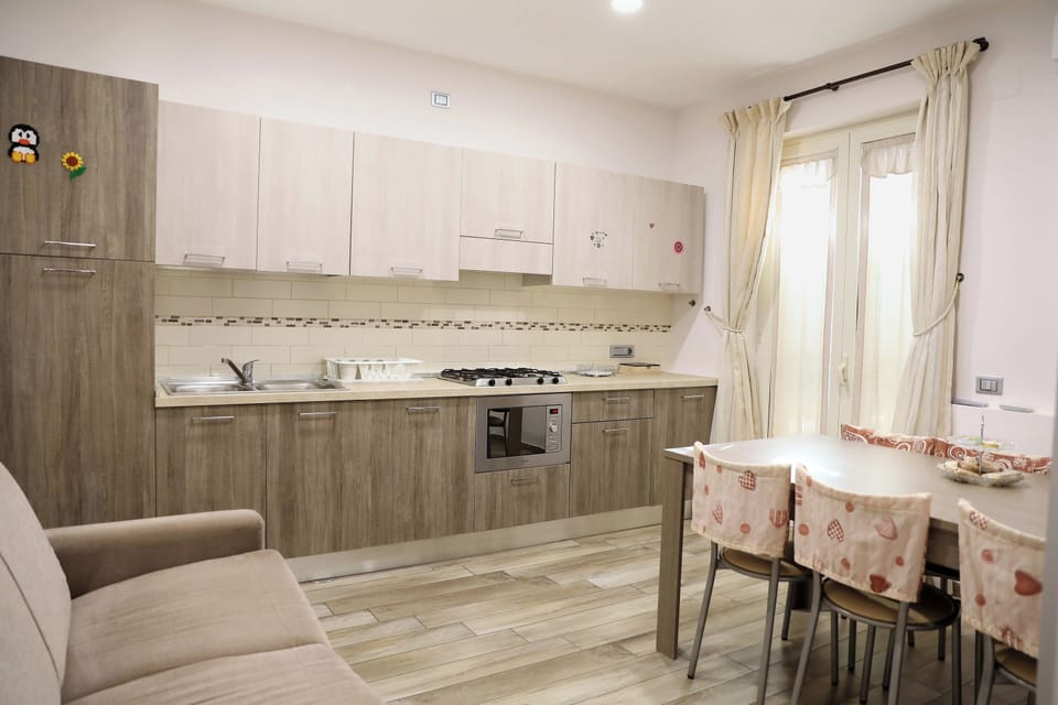 Family Apartment, 2 Bedrooms, Garden View, Garden Area (APOLLO) | Living area | Flat-screen TV, printers