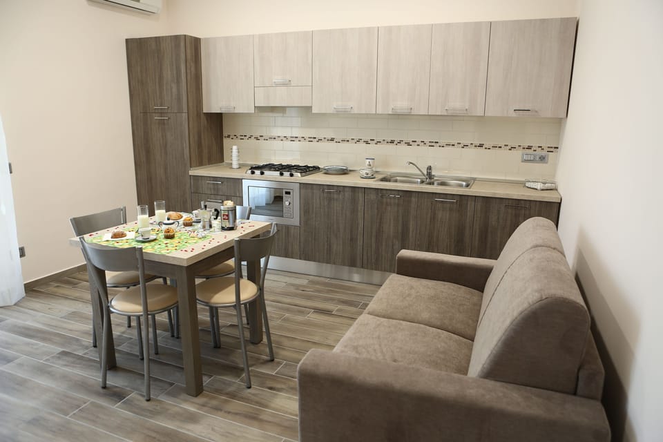 Family Apartment, 2 Bedrooms, Garden View, Garden Area (APOLLO) | Private kitchenette | Full-size fridge, cleaning supplies, paper towels