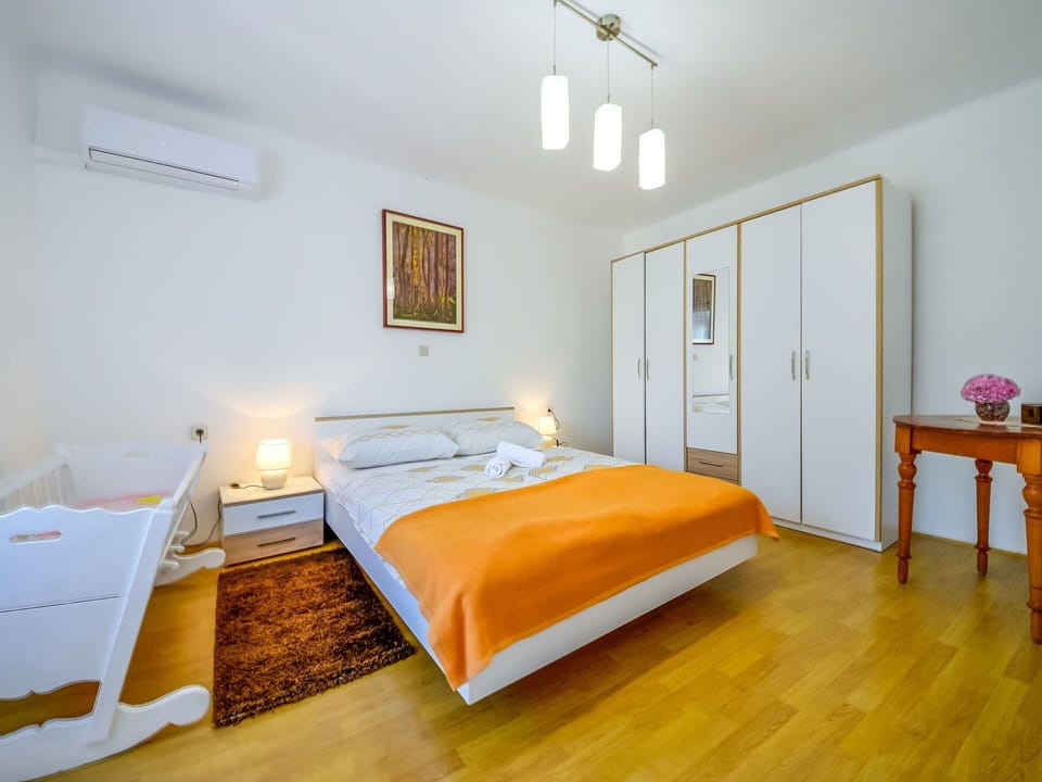 Furniture, Building, Comfort, Door, Bed Frame, Wood, Orange, Lighting, House