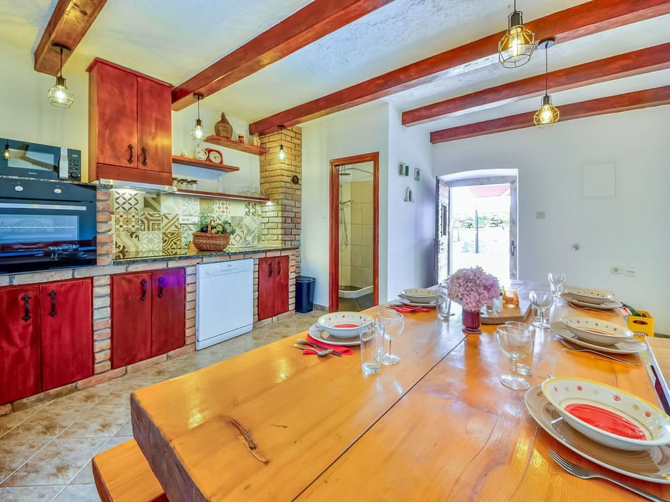Furniture, Property, Table, Wood, Orange, Interior Design, Cabinetry, Floor, Flooring, Hardwood