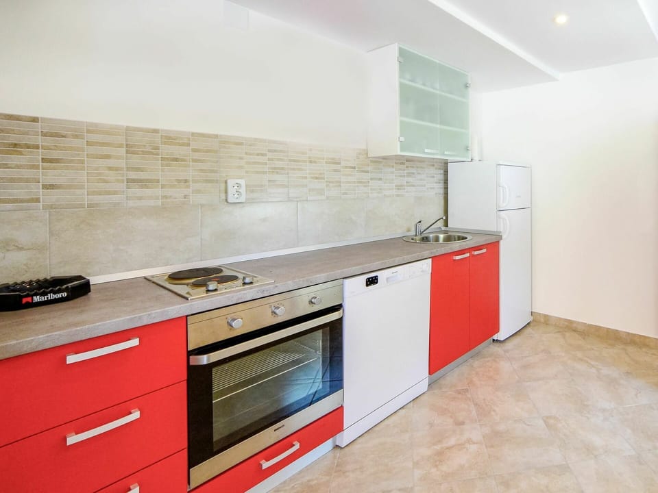 Cabinetry, Countertop, Tap, Building, Kitchen Stove, Sink, Drawer, Kitchen, Wood, Interior Design