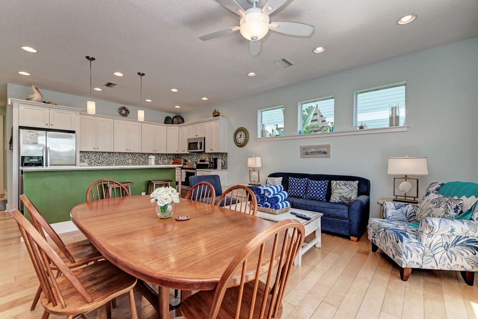 Villa Marianne dining table view to living room from the master bedroom doorway