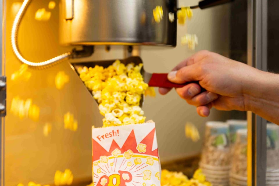 Make your movie nights unforgettable with fresh popcorn at your fingertips. The vintage-style popcorn machine turns any evening into your own private theater experience.