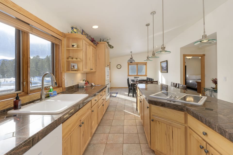 A large spacious kitchen awaits your culinary delights