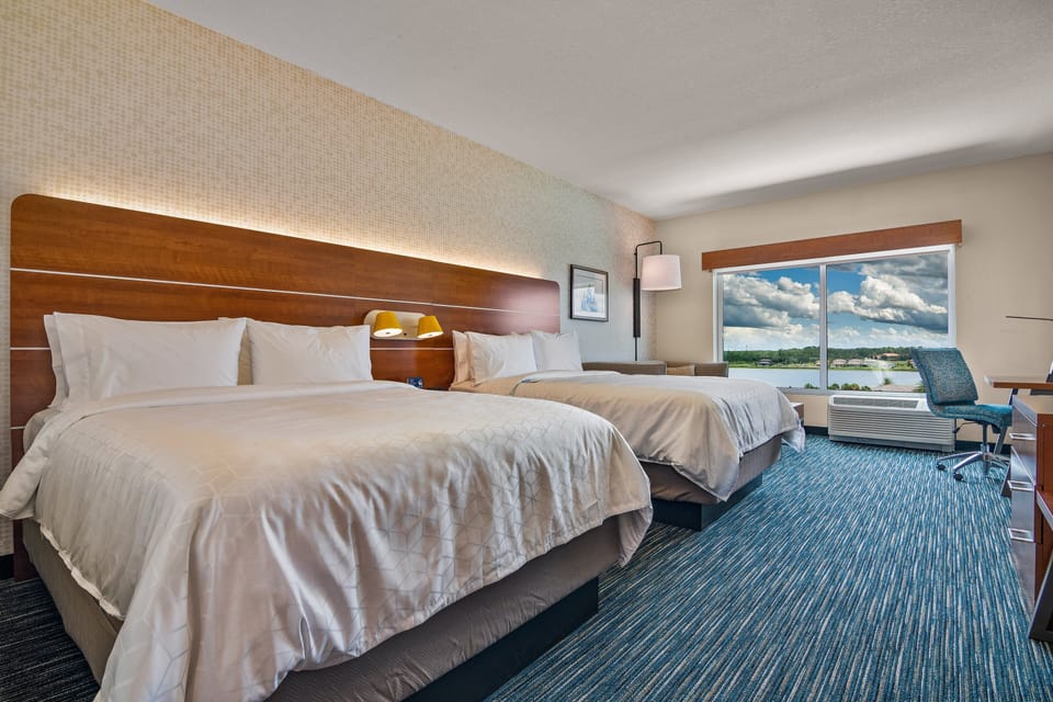 Suite, Multiple Beds | In-room safe, desk, laptop workspace, blackout drapes