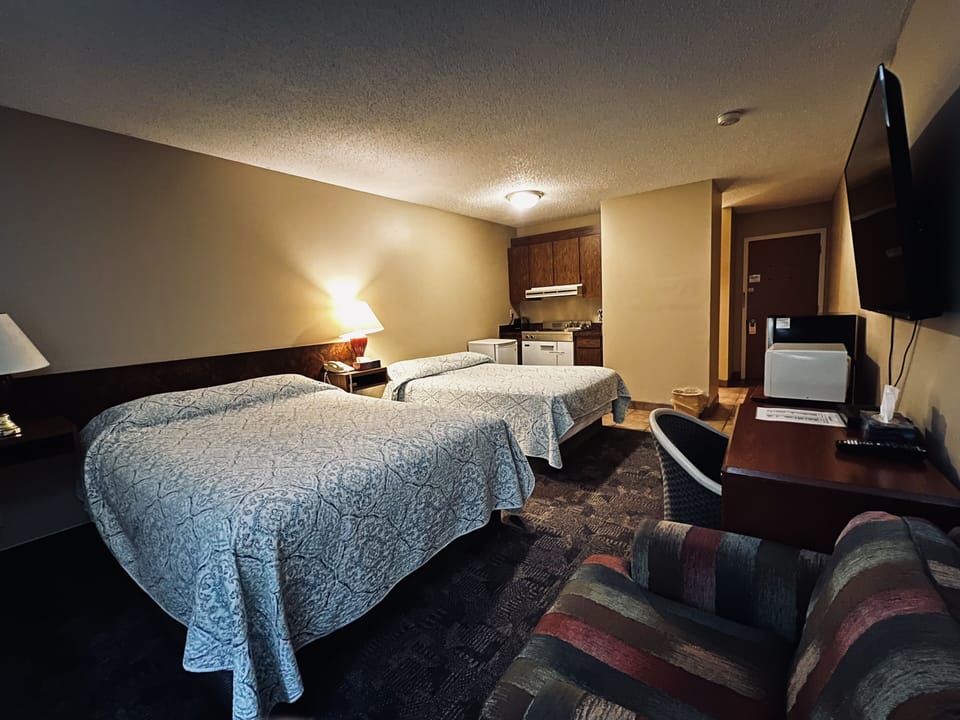 Family Studio Suite, 2 Double Beds, Kitchenette | Desk, laptop workspace, blackout drapes, WiFi (free)