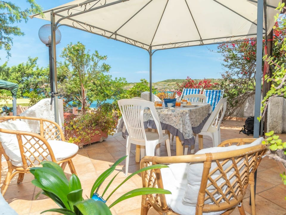 Table, Furniture, Plant, Property, Chair, Azure, Outdoor Table, Sky, Outdoor Furniture, Shade