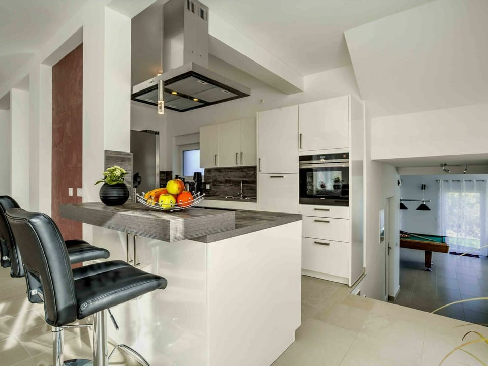 Countertop, Room, Property, Furniture, Kitchen, Cabinetry, Interior Design, Building, Yellow, House