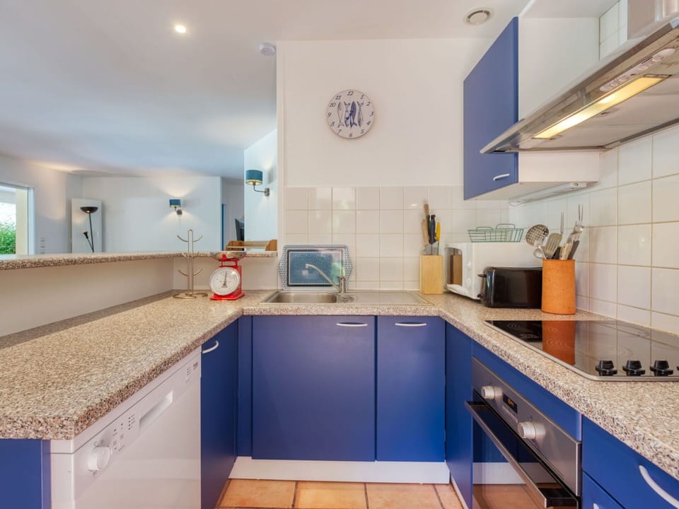 Tap, Cabinetry, Kitchen Sink, Countertop, Sink, Plumbing Fixture, Kitchen, Interior Design, Flooring, Floor