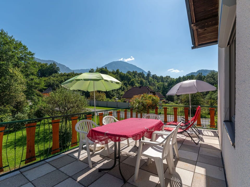 Property, Sky, Furniture, Plant, Umbrella, Table, Chair, Shade, Outdoor Furniture, Tree